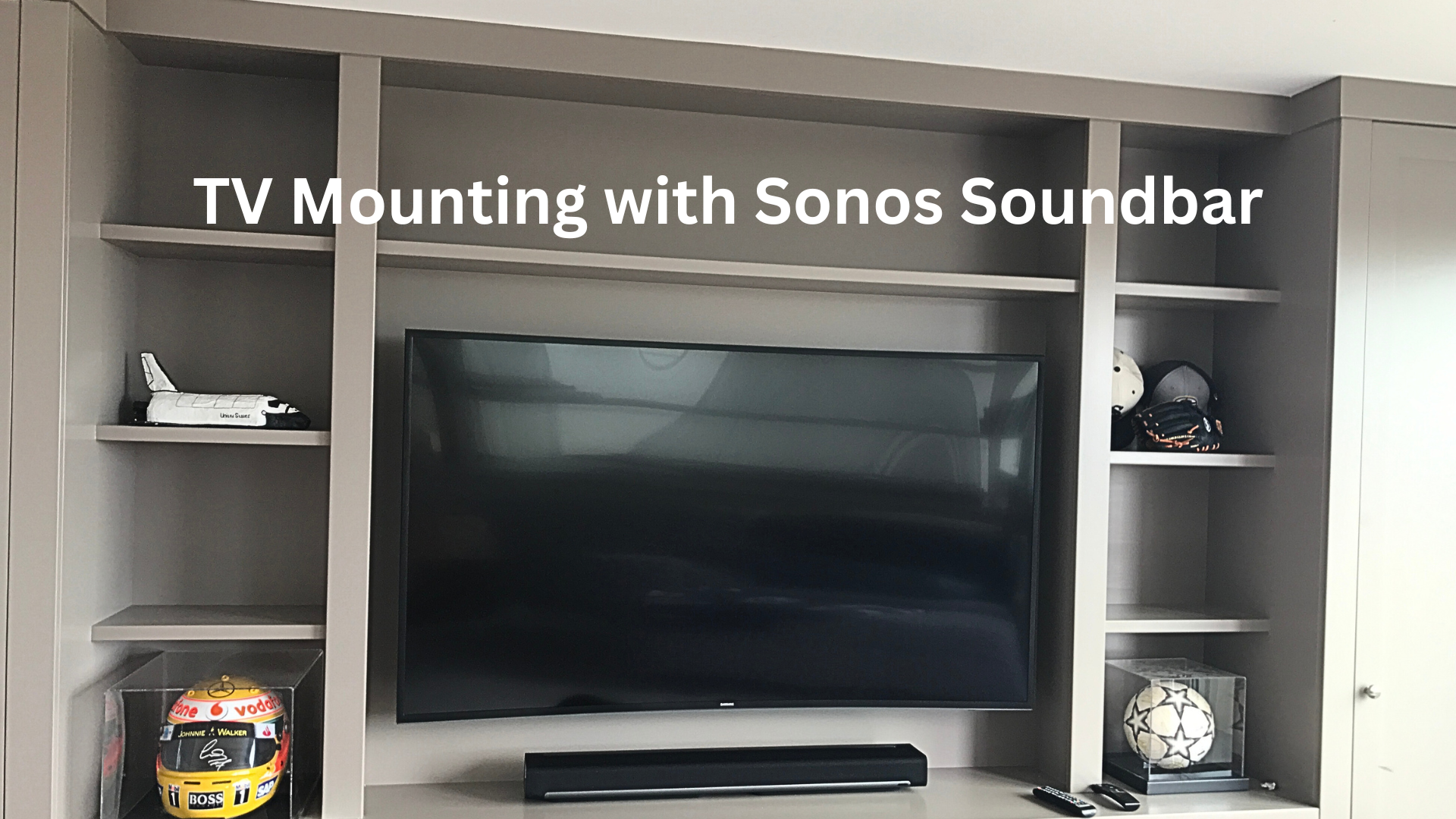 A newly installed home cinema system by professional TV installers, featuring a large mounted screen surrounded by speakers for an immersive viewing experience.